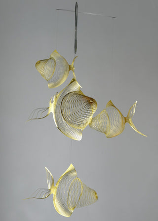 Fish mobile from brass, 4 part goldfish kinetic art from the side